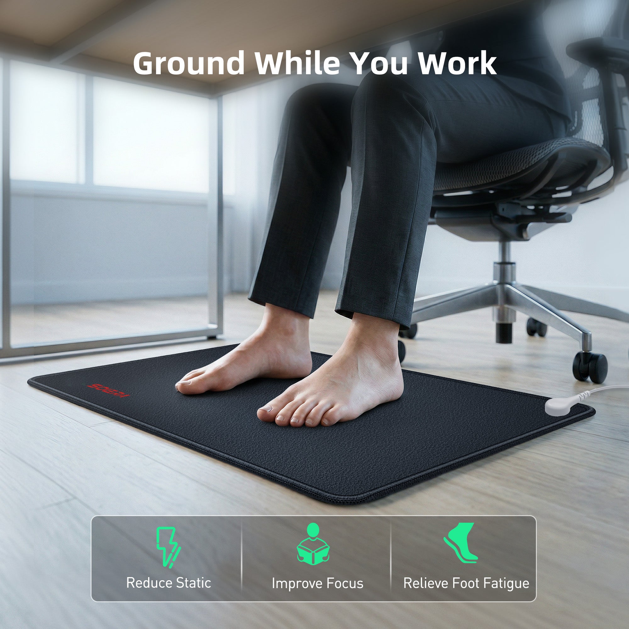Ground while you work — grounding mat used as a foot mat at a desk